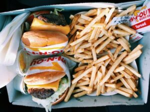 In-N-Out Burger hamburger and fries fast food service business market strategy for customers in California regionalism